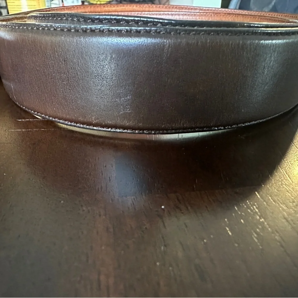 Cole Haan reversible belt. Size 42 silver buckle. Brown & dark brown